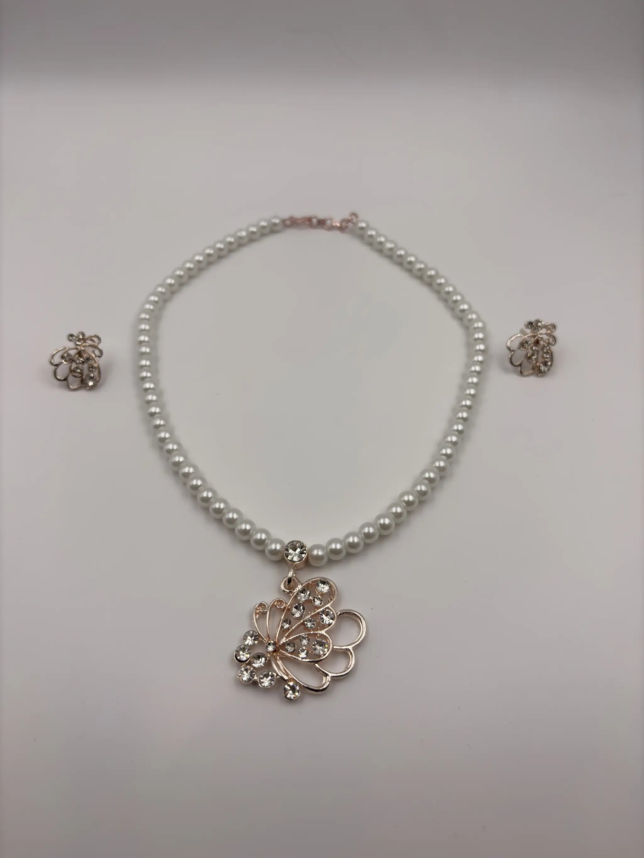 Pearl Necklace with Butterfly Crystal Pendant and Matching Earrings
