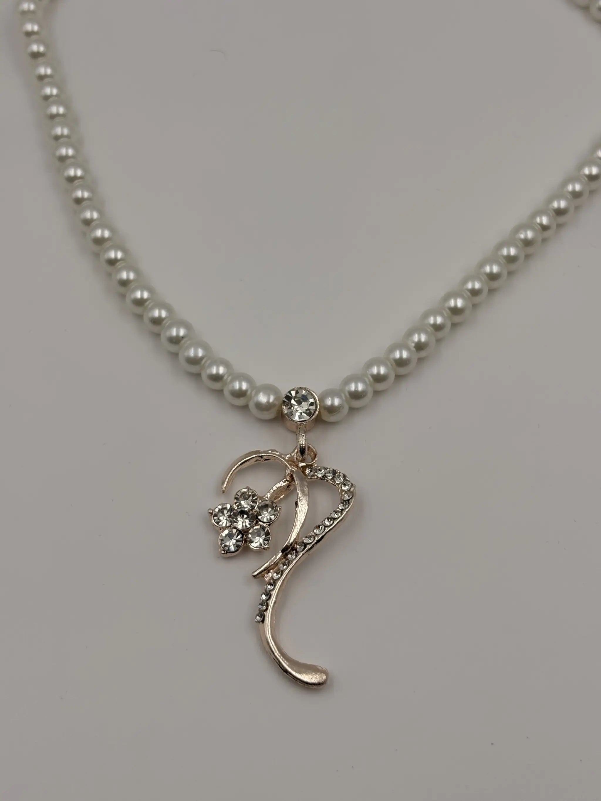 White Pearl Necklace with Curved Gold Pendant and Earrings